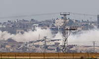Xe tăng và binh lính Israel hoạt động ở Dải Gaza ngày 21/12. (Ảnh: Reuters)