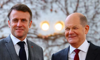 Tổng thống Pháp Emmanuel Macron và Thủ tướng Đức Olaf Scholz. (Ảnh: Reuters)