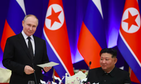 Tổng thống Nga Vladimir Putin và Chủ tịch Triều Tiên Kim Jong Un trong tiệc chiêu đãi tại Bình Nhưỡng ngày 19/6. (Ảnh: Sputnik)