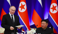 Tổng thống Nga Vladimir Putin và Chủ tịch Triều Tiên Kim Jong Un tại tiệc chiêu đãi ở Bình Nhưỡng ngày 19/6. (Ảnh: Sputnik)