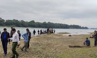 Cả trăm người tìm kiếm hai cháu bé mất tích dưới sông Lam