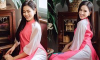 Hoa hậu Đỗ Thị Hà đẹp nền nã với áo dài hồng trong ngày mùng 5 Tết
