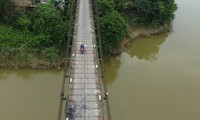 The nearly 30-year-old suspension bridge is in disrepair, banning car traffic