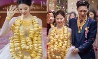 Trung Quốc: Cô dâu &apos;gây sốt&apos; khi đeo 100 chiếc vòng vàng nặng trĩu cổ trong đám cưới