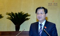 Tổng TTCP Lê Minh Khái báo cáo QH về Dự thảo Luật Phòng chống tham nhũng. Ảnh Như Ý