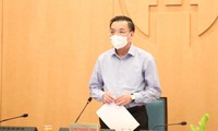 Chủ tịch UBND thành phố Hà Nội Chu Ngọc Anh báo cáo tại cuộc họp