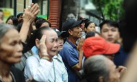 Hình ảnh xúc động người dân tiễn đưa Chủ tịch nước Trần Đại Quang
