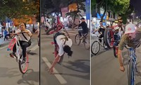 Nhóm người nước ngoài đi xe đạp bốc đầu, đánh võng trên đường phố Hà Nội