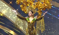 Ngọc Thảo mặc &apos;Lá ngọc cành vàng&apos; nặng 30 kg, toả sáng trên sân khấu Miss Grand