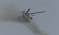 [VIDEO] Trực thăng Nga phóng tên lửa, yểm trợ quân đội Syria tấn công IS