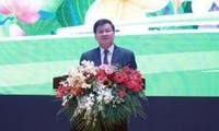 Đồng chí Thongloun Sisoulith, Tổng Bí thư, Chủ tịch nước Lào, phát biểu tại lễ kỷ niệm. Ảnh: Bá Thành/TTXVN
