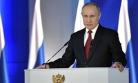 Tổng thống Nga Vladimir Putin đọc thông điệp Liên bang ngày 21/2. (Ảnh: Sputnik)