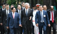 Thủ tướng Phạm Minh Chính và Thủ tướng Singapore Lý Hiển Long tại cuộc gặp sáng 28/8. (Ảnh: Như Ý)