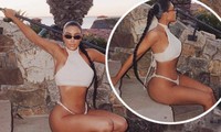 Kim Kardashian khoe vòng 3 &apos;bốc lửa&apos; với đồ bơi bé xíu