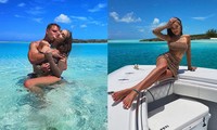 Hoa hậu Hoàn vũ Olivia Culpo ôm hôn mặn nồng bạn trai cầu thủ ở biển