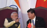 Thủ tướng Ấn Độ Narendra Modi nói chuyện với Chủ tịch Trung Quốc Tập Cận Bình tại hội nghị thượng đỉnh BRICS tại Ấn Độ năm 2016. Ảnh: Getty Images.
