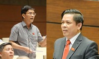 ĐBQH Hoàng Quang Hàm tranh luận với Bộ trưởng Bộ GTVT Nguyễn Văn Thể. Ảnh: Như Ý.