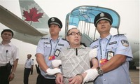 Lai Changxing, một nghi can bỏ trốn ra nước ngoài bị dẫn độ về Trung Quốc. ẢNH: Reuters.