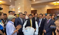 TS Nguyễn Hữu Lệ đang giới thiệu công ty mình tại Hội nghị Người Việt Nam toàn thế giới tại TPHCM. Ảnh: do nhân vật cung cấp