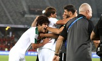 Các cầu thủ Iraq ăn mừng chiến thắng phút chót