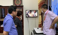 Ðoàn kiểm tra số 3 của Bộ GD&ÐT kiểm tra khu vực chấm thi tại Hội đồng thi tỉnh Quảng Bình. Ảnh Nghiêm Huê