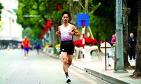 Cao Hà, nhà vô địch Tiền Phong Marathon hệ phong trào đầu tiên Ảnh: Trần Lê Tuấn
