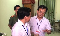 Bị can Nguyễn Quang Vinh (phải), tổ trưởng tổ chấm thi trắc nghiệm tỉnh Hòa Bình đã bị bắt từ tháng 8/2018 Ảnh: Nghiêm Huê