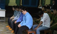 Phạm Sỹ Hoài Như (áo trắng, hàng ghế sau) tại phiên tòa phúc thẩm trước đây. Ảnh: Tân Châu 