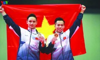 Thanh Tùng (phải) là VĐV thứ 2 của TTVN giành vé tham dự Olympic Tokyo 2020