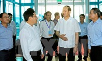 Chủ tịch nước Trần Đại Quang kiểm tra công tác an ninh tại sân bay quốc tế Đà Nẵng. Ảnh: TTXVN.