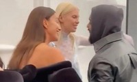 Kanye West ôm Irina Shayk ở hậu trường show diễn