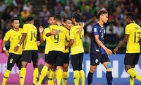 Malaysia (áo vàng) đã rất nhọc nhằn mới có thể giành chiến thắng sát nút trước Campuchia.