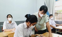 Thí sinh ở TPHCM tại buổi làm thủ tục thi ngày 5/6 ảnh: Nguyễn Dũng