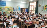 Học sinh Trường Tiểu học Lê Văn Thọ, quận 12, TPHCM trong buổi tựu trường ngày 1/9 