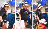 Nữ công an Lê Thị Hiền gây rối tại sân bay Tân Sơn Nhất. Ảnh cắt từ clip.
