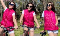&quot;Hoa hậu yêu màu hồng&quot; Đỗ Thị Hà khoe ảnh đi xe đạp, rạng rỡ trong nắng Xuân tại Mỹ
