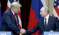 Tổng thống Nga Putin (phải) và Tổng thống Mỹ Trump (trái). Ảnh: Tass