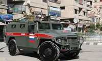 Xe của lực lượng vũ trang Nga. Ảnh: Tass