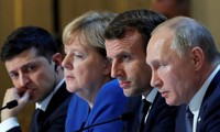Từ phải sang: Tổng thống Nga Vladimir Putin, Tổng thống Pháp Emmanuel Macron, Thủ tướng Đức Angela Merkel và Tổng thống Ukraine Volodymyr Zelensky. Ảnh: Reuters