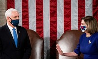 Phó Tổng thống Mike Pence và Chủ tịch Hạ viện Nancy Pelosi. Ảnh: Reuters