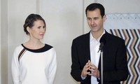 Ông Assad và phu nhân. Ảnh: SANA