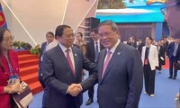 Thủ tướng Phạm Minh Chính bấm nút khai trương khu gian hàng Việt Nam tại CAEXPO