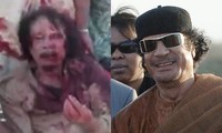 Gaddafi máu me đầy người trước khi bị quân nổi dậy xử tử.
