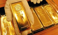 Kết thúc tháng 3, giá vàng thế giới tăng 150 USD/ounce. Ảnh minh hoạ 