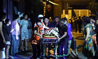 Công tác cứu hộ, cứu nạn cho nạn nhân vụ cháy chung cư mini ở Hà Nội. (Ảnh TT). 