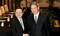  Ông Vương Úc Kỳ (trái) và ông Trương Chí Quân trong cuộc hội đàm hôm 11/2. Ảnh: SCMP