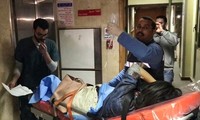 Bệnh nhân Viện được điều trị tại bệnh viện Al-Haram. Ảnh: AFP.