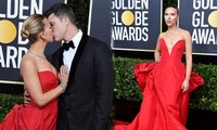 &apos;Góa phụ đen&apos; Scarlett Johansson hôn đắm đuối vị hôn phu tại Quả cầu vàng