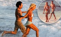 Lily James ‘bốc lửa’ với bikini khi tái hiện đám cưới trên bãi biển của cựu mẫu Playboy