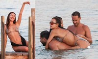 Irina Shayk sexy hết nấc với bikini bé xíu, ôm ấp bạn khác giới trên biển